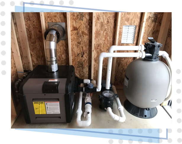 A pool pump and filter system in the corner of a room.