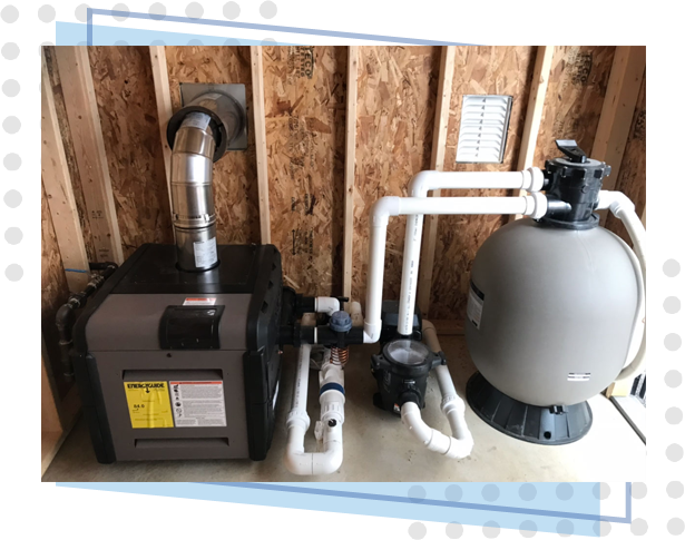 A pool pump and filter system in the corner of a room.